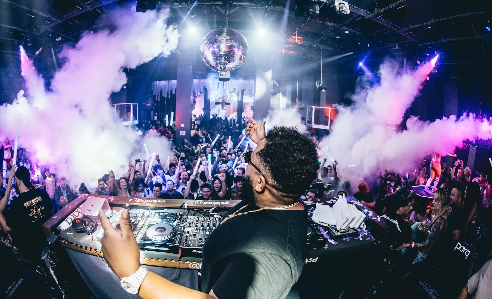 man playing DJ turntable